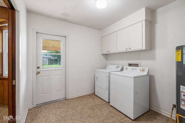 4404 Curtis Loop, Bossier City, LA 71112 - laundry area with independent washer and dryer, cabinet space, water heater, and baseboards