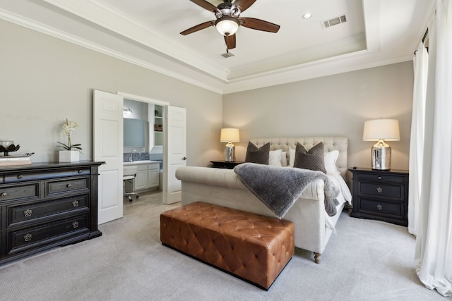 4104 Navarro Way, Frisco, TX 75034 - bedroom with a tray ceiling, light colored carpet, ornamental molding, ensuite bath, and a ceiling fan