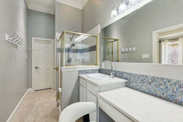 4104 Navarro Way, Frisco, TX 75034 - bathroom featuring ornamental molding, vanity, a stall shower, tile patterned flooring, and tasteful backsplash