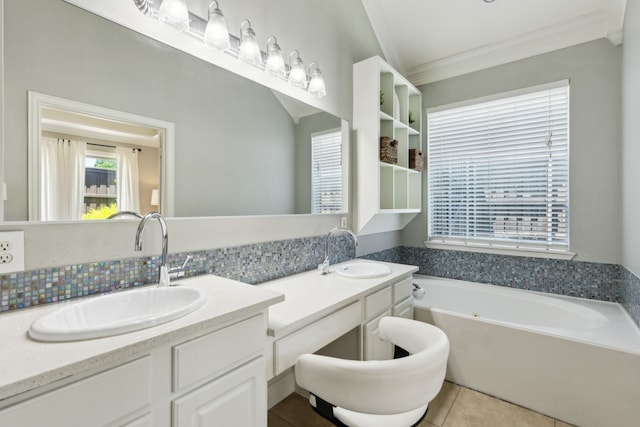 4104 Navarro Way, Frisco, TX 75034 - bathroom featuring double vanity, ornamental molding, a garden tub, and tile patterned flooring