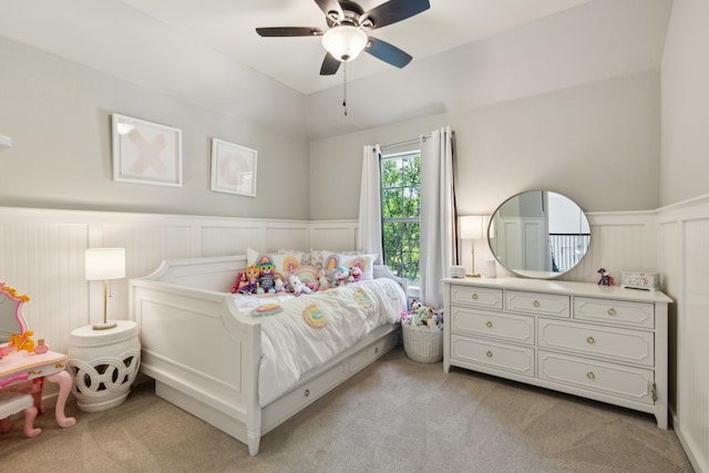 4104 Navarro Way, Frisco, TX 75034 - bedroom with light carpet, wainscoting, a decorative wall, and a ceiling fan