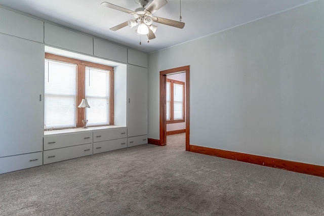 732 N Patrick St, Dublin, TX 76446 - carpeted empty room with baseboards and ceiling fan