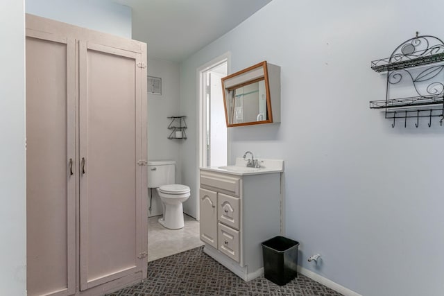 732 N Patrick St, Dublin, TX 76446 - bathroom with vanity and toilet