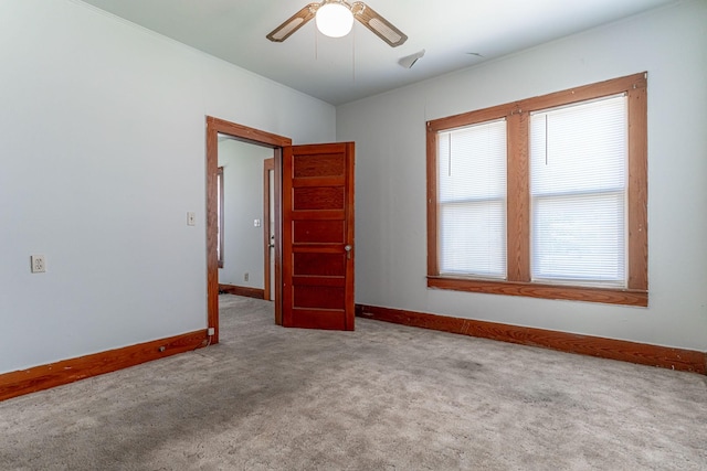 732 N Patrick St, Dublin, TX 76446 - unfurnished room with carpet flooring, baseboards, and a ceiling fan