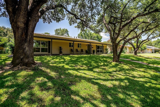 4408 Hildring Dr E, Fort Worth, TX 76109 - view of front of home with a front lawn