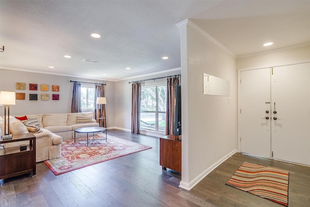 4408 Hildring Dr E, Fort Worth, TX 76109 - living room featuring crown molding, dark wood-type flooring, baseboards, and recessed lighting