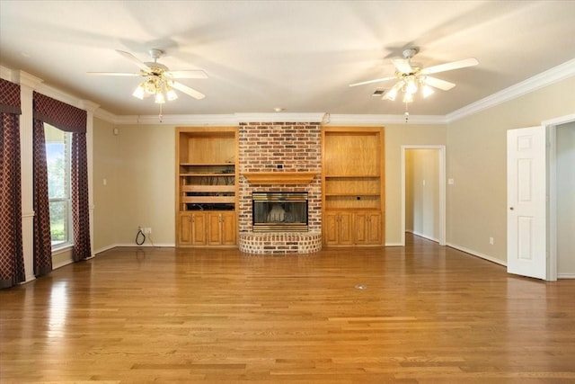 1642 Greenview Ct, Aledo, TX 76008 - unfurnished living room with a ceiling fan, light wood-type flooring, crown molding, and a fireplace