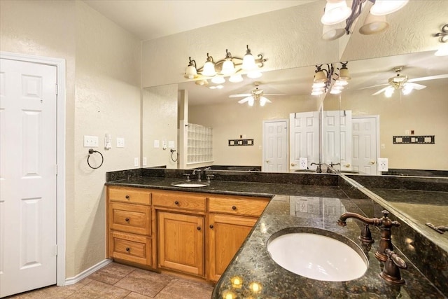 1642 Greenview Ct, Aledo, TX 76008 - bathroom featuring a textured wall, vanity, ceiling fan, and tile patterned floors