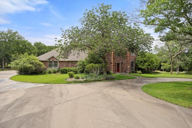 1642 Greenview Ct, Aledo, TX 76008 - view of front of property featuring curved driveway, a front lawn, and brick siding