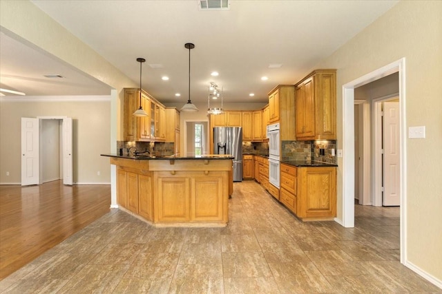 1642 Greenview Ct, Aledo, TX 76008 - kitchen featuring stainless steel refrigerator with ice dispenser, dark countertops, a peninsula, decorative backsplash, and recessed lighting