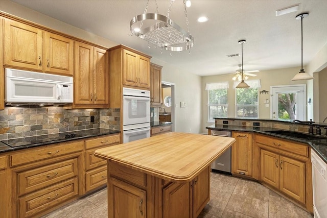 1642 Greenview Ct, Aledo, TX 76008 - kitchen with white appliances, wooden counters, decorative backsplash, pendant lighting, and ceiling fan