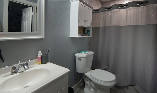 2421 Langston St, Fort Worth, TX 76105 - bathroom with vanity, toilet, a shower with curtain, and tile patterned flooring