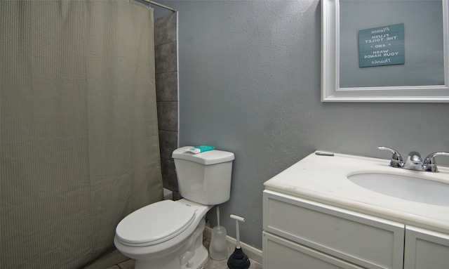 2421 Langston St, Fort Worth, TX 76105 - bathroom featuring vanity, toilet, a shower with curtain, and baseboards