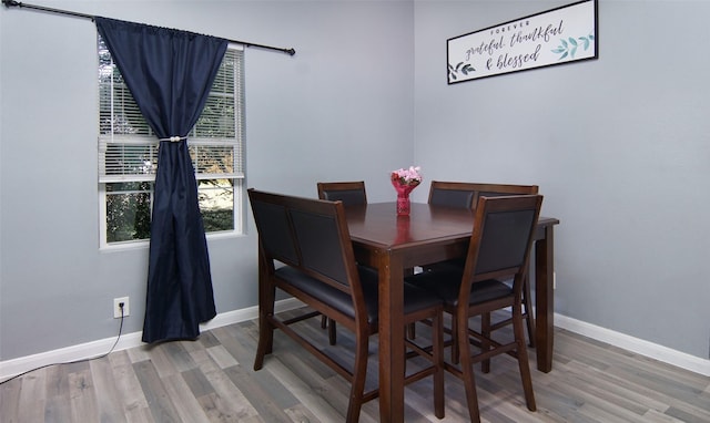 2421 Langston St, Fort Worth, TX 76105 - dining room featuring baseboards and wood finished floors
