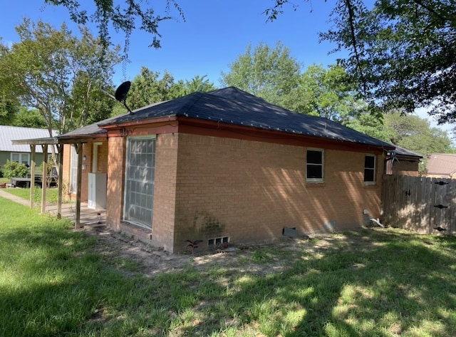 601 N Newsom St, Mineola, TX 75773 - view of side of property with brick siding