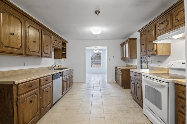 5161 N Hwy 271, Pittsburg, TX 75686 - kitchen featuring white electric stove, under cabinet range hood, stainless steel dishwasher, a sink, and light countertops