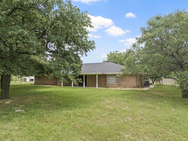 5161 N Hwy 271, Pittsburg, TX 75686 - view of grassy yard with central AC unit