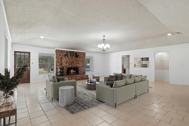 5161 N Hwy 271, Pittsburg, TX 75686 - living area featuring a textured ceiling, a chandelier, recessed lighting, a fireplace, and light tile patterned floors