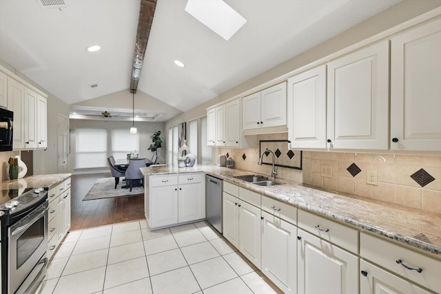 2420 Cross Timbers Trl, Arlington, TX 76006 - kitchen with appliances with stainless steel finishes, a sink, backsplash, and recessed lighting
