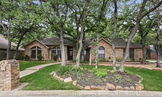 2420 Cross Timbers Trl, Arlington, TX 76006 - ranch-style house with brick siding, a front lawn, and roof with shingles