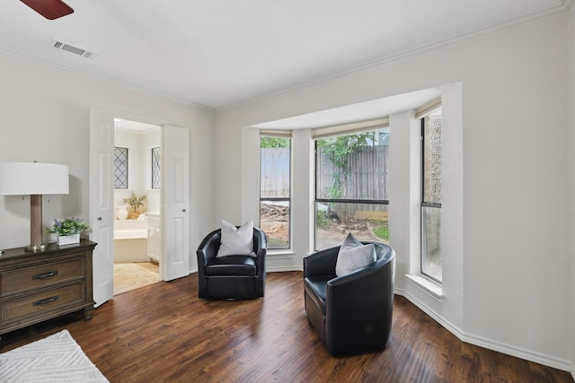 2420 Cross Timbers Trl, Arlington, TX 76006 - living area with crown molding, wood finished floors, a ceiling fan, and baseboards
