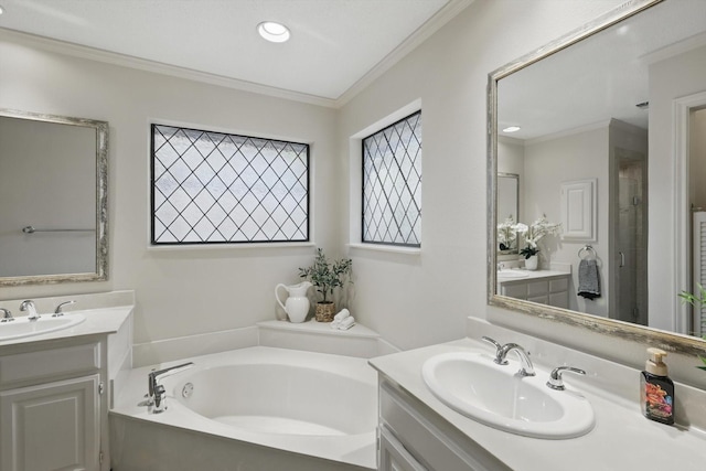 2420 Cross Timbers Trl, Arlington, TX 76006 - full bathroom featuring two vanities, a garden tub, ornamental molding, a stall shower, and recessed lighting