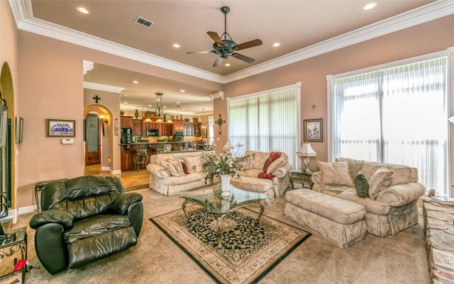 520 Canterbury Ln, Bossier City, LA 71111 - living area featuring arched walkways, ornamental molding, a ceiling fan, recessed lighting, and baseboards