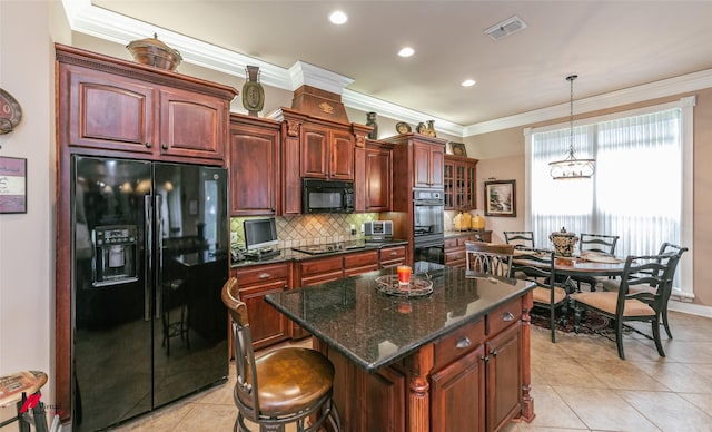 520 Canterbury Ln, Bossier City, LA 71111 - kitchen with black appliances, light tile patterned flooring, crown molding, tasteful backsplash, and a kitchen island