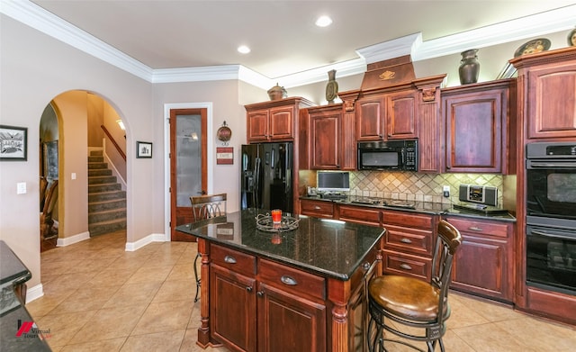 520 Canterbury Ln, Bossier City, LA 71111 - kitchen featuring black appliances, arched walkways, dark brown cabinets, crown molding, and recessed lighting