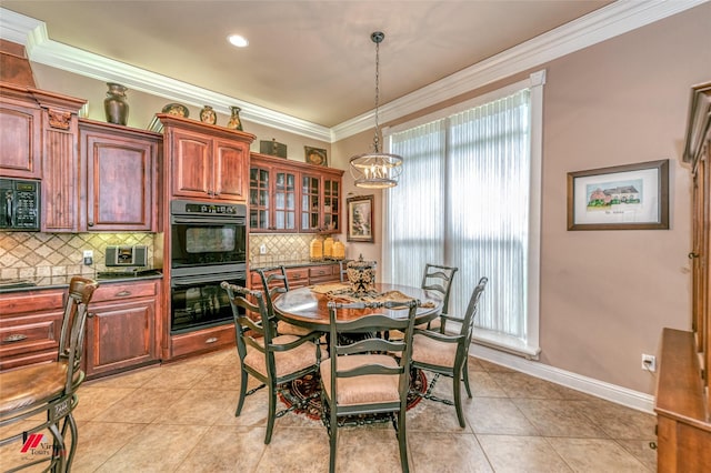 520 Canterbury Ln, Bossier City, LA 71111 - dining area with ornamental molding, light tile patterned flooring, healthy amount of natural light, a chandelier, and baseboards