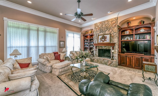 520 Canterbury Ln, Bossier City, LA 71111 - carpeted living room featuring ceiling fan, recessed lighting, a stone fireplace, crown molding, and built in shelves
