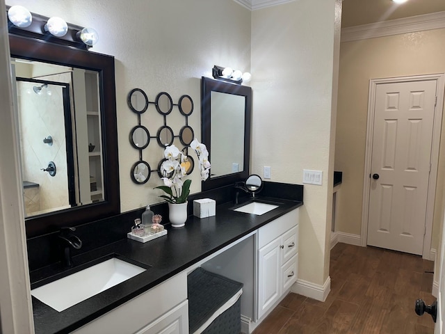 749 Ranch Rd, Fort Worth, TX 76131 - full bathroom featuring crown molding, wood finished floors, double vanity, and an enclosed shower