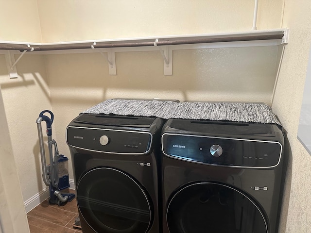 749 Ranch Rd, Fort Worth, TX 76131 - laundry room with washer and clothes dryer and dark wood-style floors