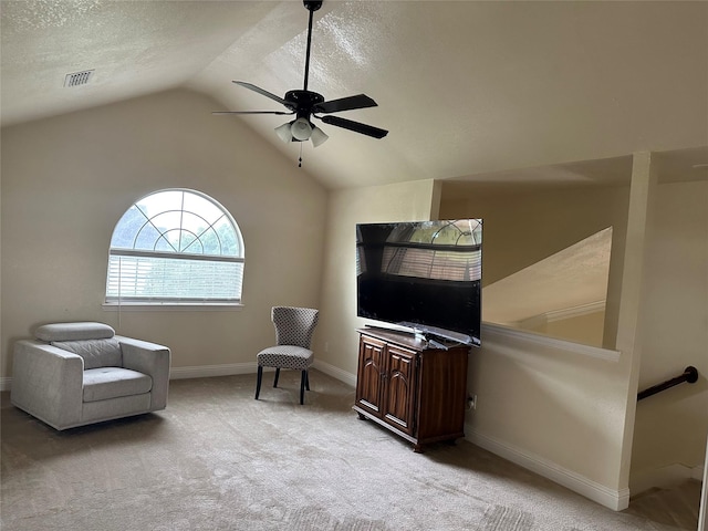 749 Ranch Rd, Fort Worth, TX 76131 - sitting room featuring ceiling fan, vaulted ceiling, a textured ceiling, and light carpet