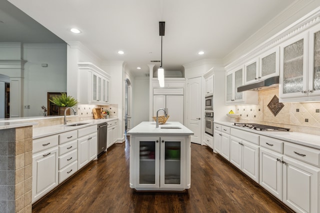 1850 Hammerly Dr, Fairview, TX 75069 - kitchen with a sink, under cabinet range hood, built in appliances, tasteful backsplash, and recessed lighting