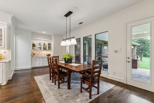 1850 Hammerly Dr, Fairview, TX 75069 - dining room featuring dark wood-style flooring, crown molding, and recessed lighting