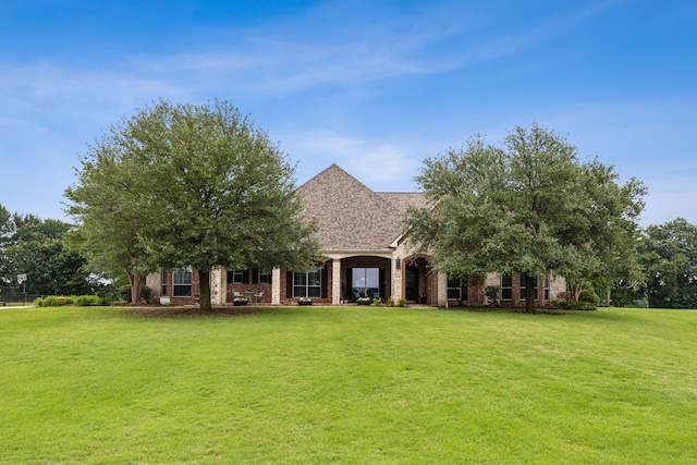1850 Hammerly Dr, Fairview, TX 75069 - view of front facade with a front lawn and brick siding