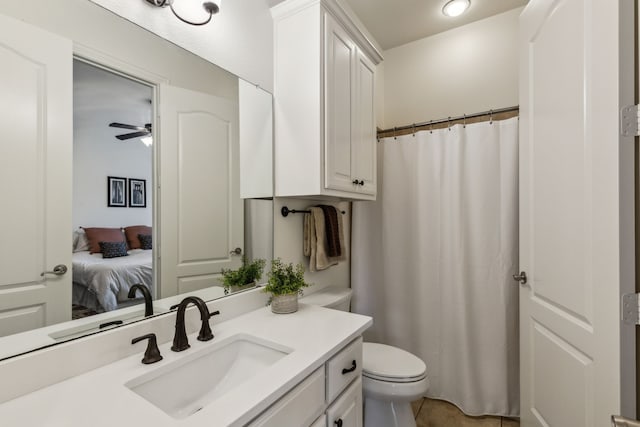 1850 Hammerly Dr, Fairview, TX 75069 - ensuite bathroom with toilet, vanity, a ceiling fan, and a shower with shower curtain
