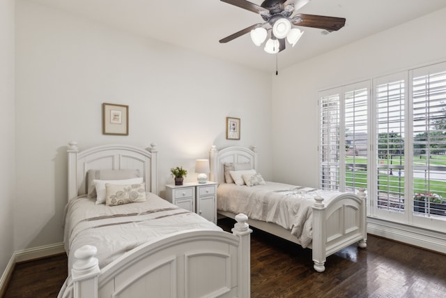 1850 Hammerly Dr, Fairview, TX 75069 - bedroom featuring dark wood-style flooring, a ceiling fan, and baseboards
