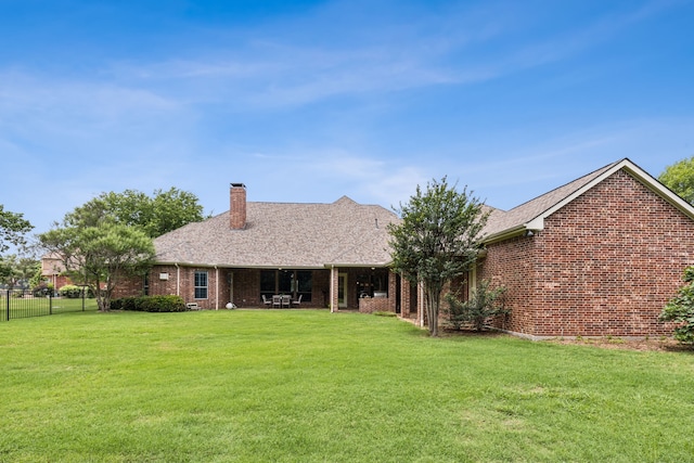 1850 Hammerly Dr, Fairview, TX 75069 - rear view of property featuring brick siding and a chimney