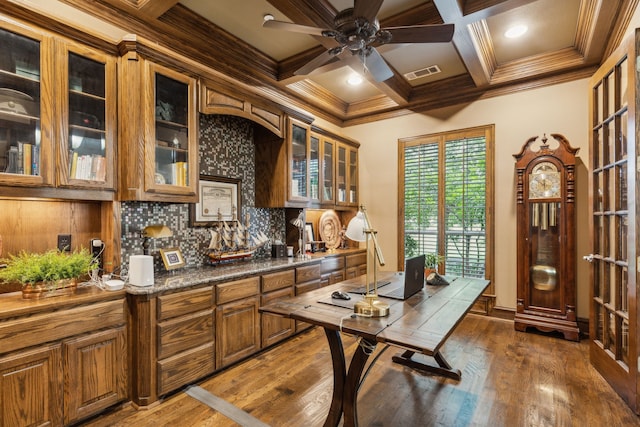 1850 Hammerly Dr, Fairview, TX 75069 - kitchen with brown cabinetry, a ceiling fan, crown molding, tasteful backsplash, and coffered ceiling