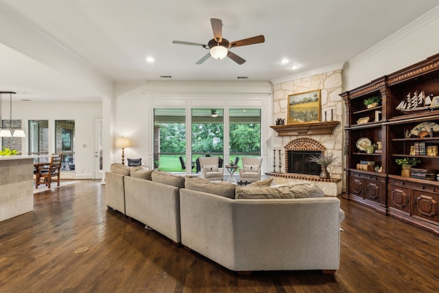 1850 Hammerly Dr, Fairview, TX 75069 - living area with a stone fireplace, a ceiling fan, dark wood finished floors, ornamental molding, and recessed lighting
