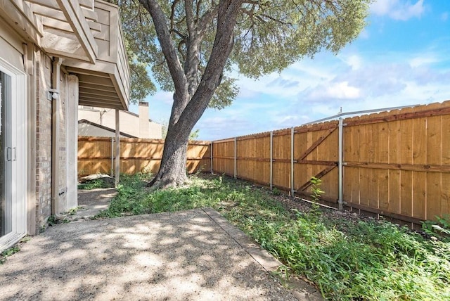 1822 Highbrook Ct, Garland, TX 75044 - fenced backyard featuring a patio