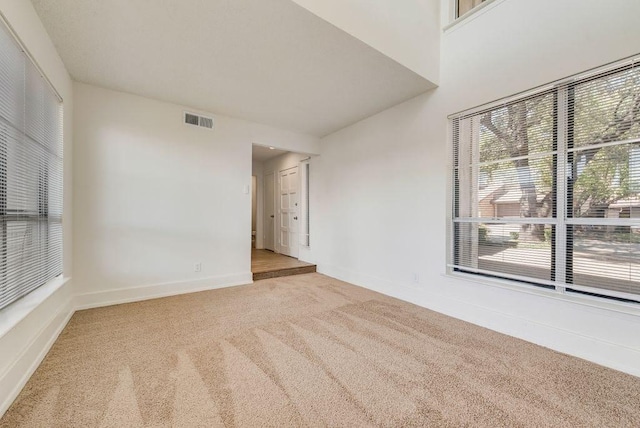1822 Highbrook Ct, Garland, TX 75044 - spare room featuring carpet floors and baseboards