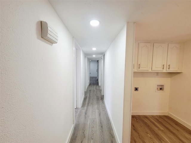3402 Jones Dr, Rowlett, TX 75088 - hallway with light wood finished floors, baseboards, and recessed lighting