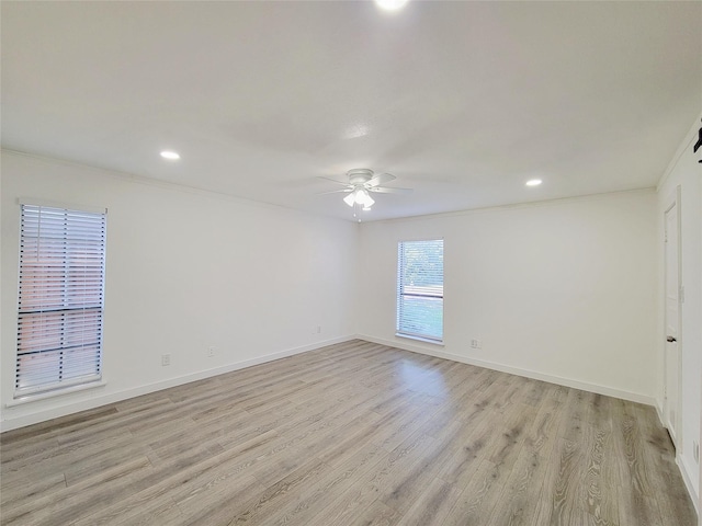 3402 Jones Dr, Rowlett, TX 75088 - spare room with a ceiling fan, light wood-type flooring, crown molding, baseboards, and recessed lighting