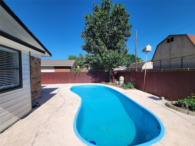 3402 Jones Dr, Rowlett, TX 75088 - view of swimming pool featuring a fenced backyard and a patio