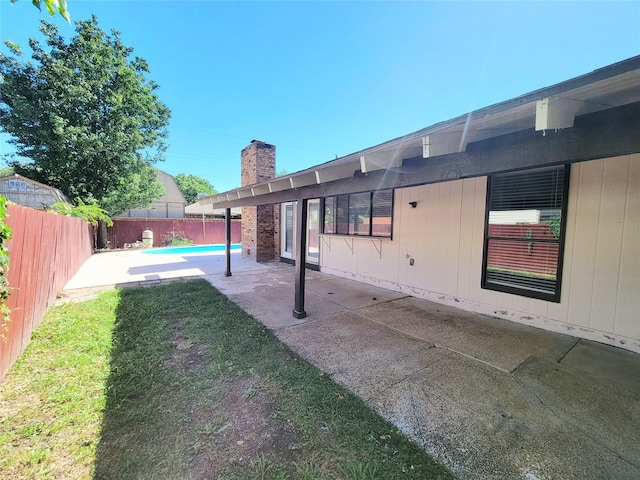 3402 Jones Dr, Rowlett, TX 75088 - fenced backyard featuring a patio area