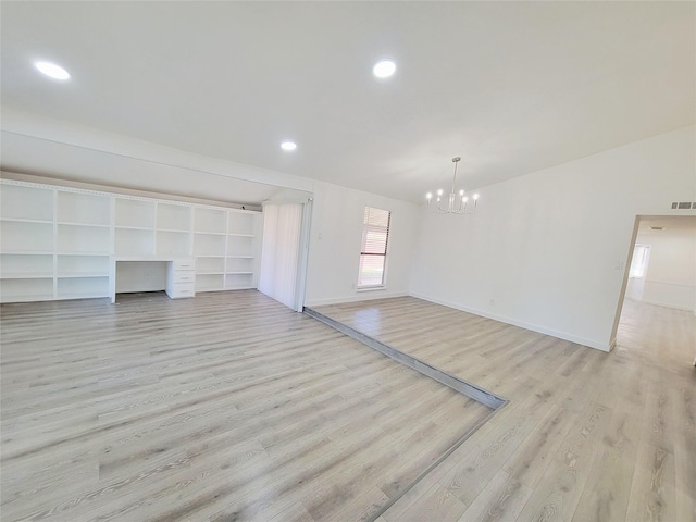 3402 Jones Dr, Rowlett, TX 75088 - unfurnished living room featuring a chandelier, light wood-type flooring, baseboards, and recessed lighting