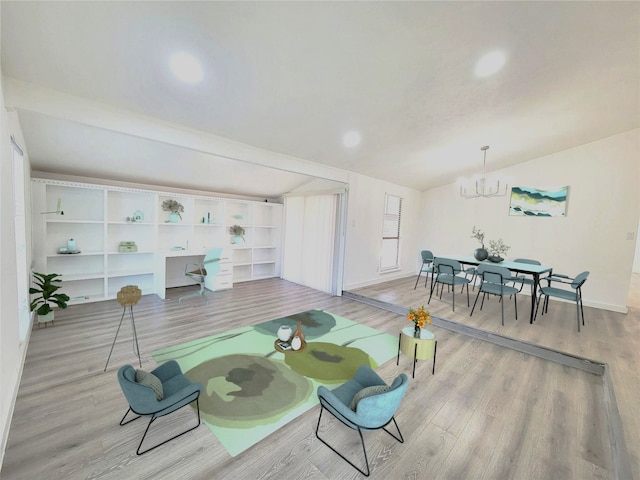 3402 Jones Dr, Rowlett, TX 75088 - playroom featuring a chandelier, wood finished floors, baseboards, recessed lighting, and vaulted ceiling